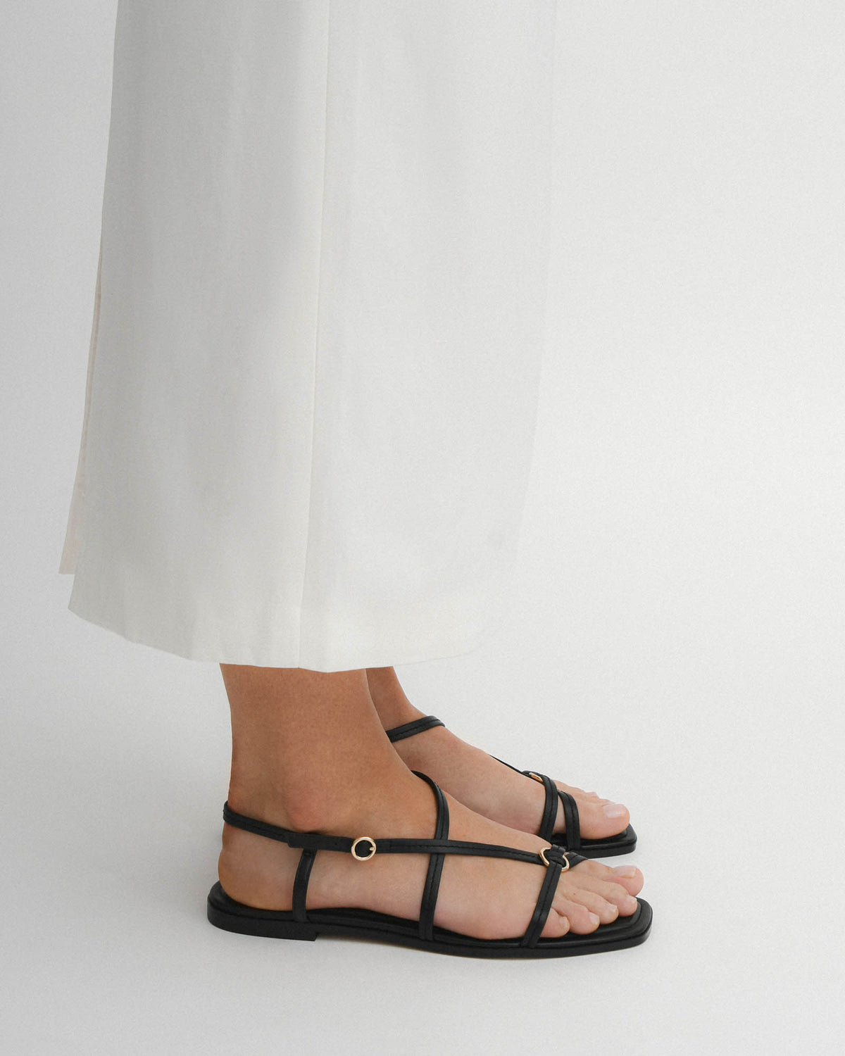 ADDI FLAT SANDALS BLACK LEATHER